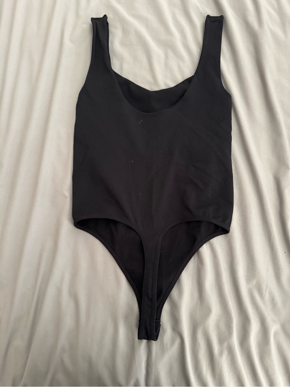 Free People Black Scoop Neck One-Piece Bodysuit